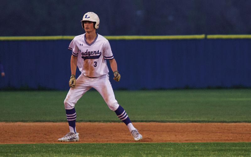 Calum Mitchell takes a lead off second base. The sophomore has been making more appearances in district play. HUNTER KING | DISPATCH RECORD