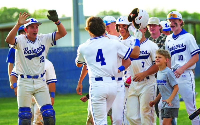HUNTER KING | DISPATCH RECORD The team celebrates Timber Gholson’s home run against Salado last Thursday night.
