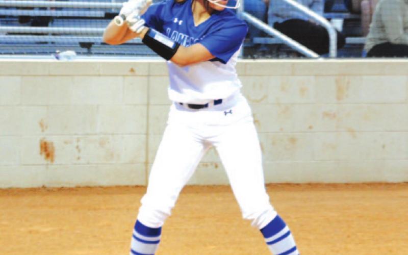 Hannah Perry awaits a pitch from Ballinger during a game last week. HUNTER KING | DISPATCH RECORD