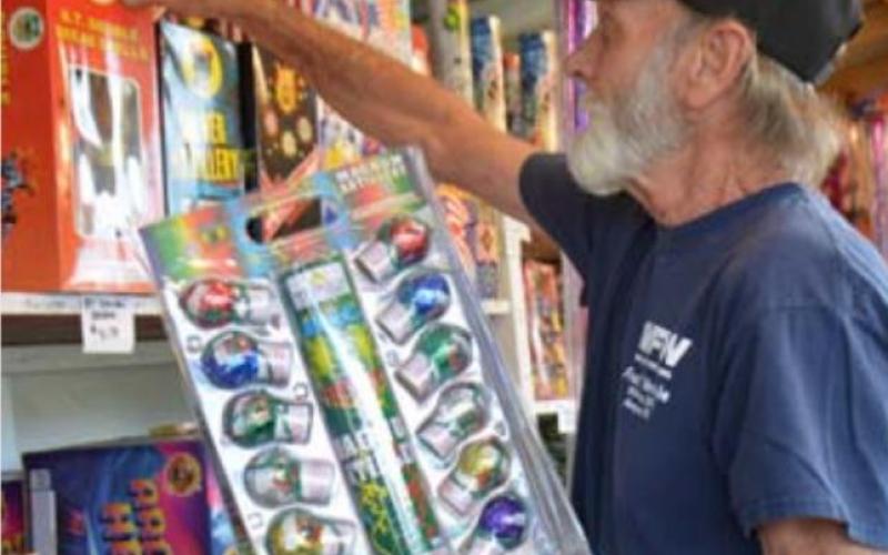 Bob Stewart of Bob’s Discount Fireworks does inventory on Wednesday. MONIQUE BRAND | DISPATCH RECORD