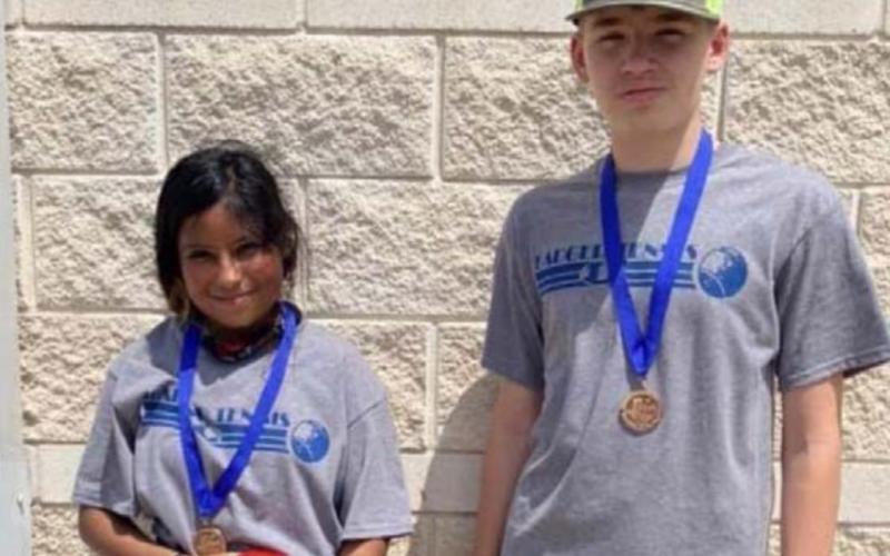 Ailin Mora/Mathis Greenburg placed third in seventh-grade mixed doubles. COURTESY PHOTO