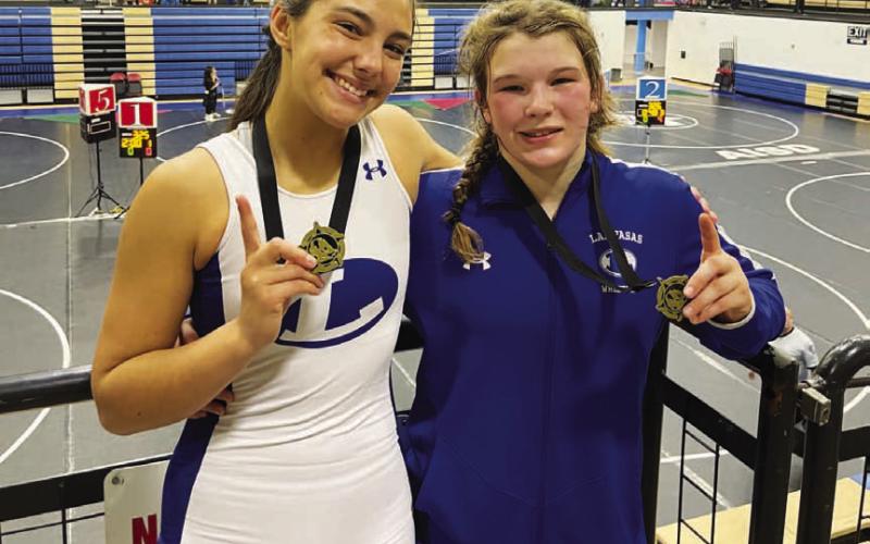Charlie Freese, left, and Taylor Martell show off their gold medals. COURTESY PHOTO