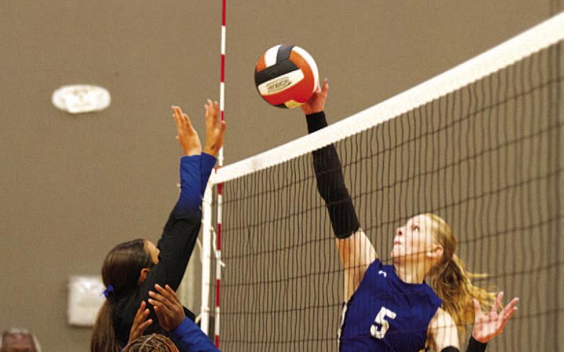HUNTER KING | DISPATCH RECORD Mattie McBeth rises up for a kill against the Copperas Cove junior varsity team last Friday.