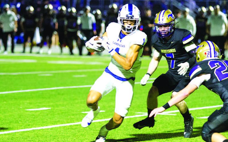 Ty Johnson led the Badgers in receiving with 94 yards against the Mustangs. HUNTER KING | DISPATCH RECORD