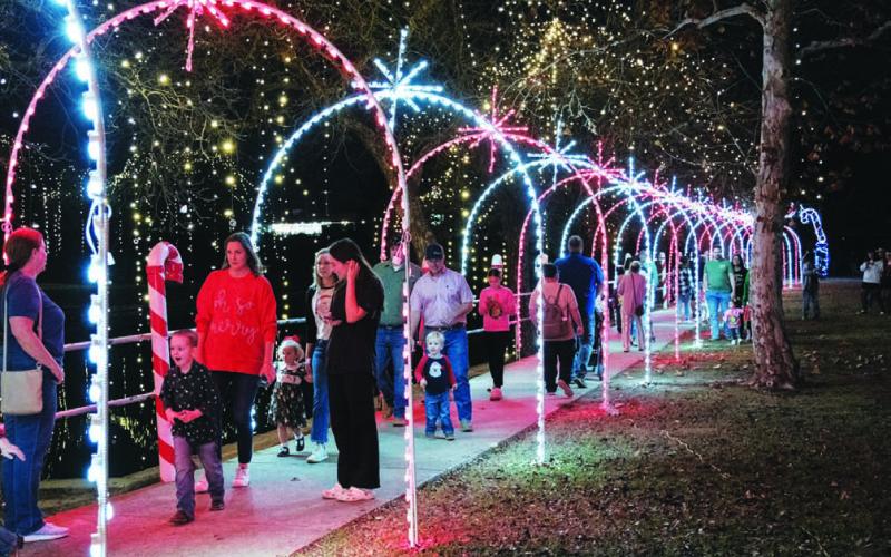 Christmas on the Creek attendees enjoy the lights along Candy Cane Lane. Vision Lampasas co-director Libby Bluntzer tells the Dispatch Record more than 500 people came to the W.M. Brook Park event a year ago. FILE PHOTO