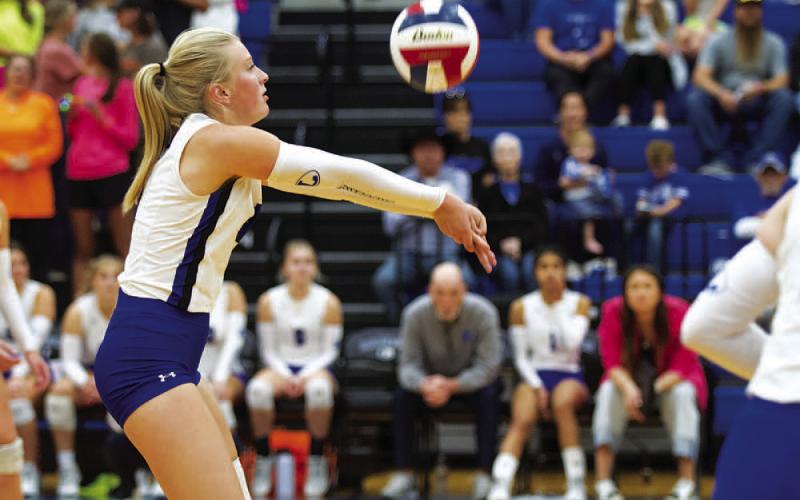 Brylie Turner passes to a teammate in the first set of Tuesday’s contest. HUNTER KING | DISPATCH RECORD