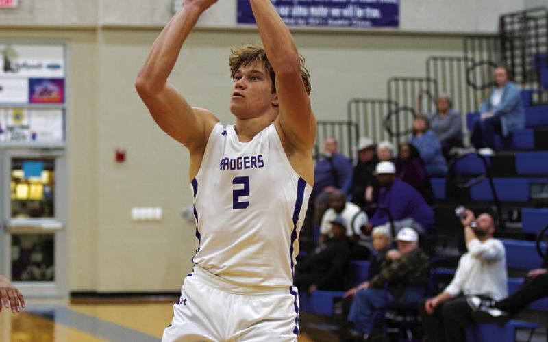 Haegan Oncken releases a three-point shot on his way to 16 points against Taylor. HUNTER KING | DISPATCH RECORD