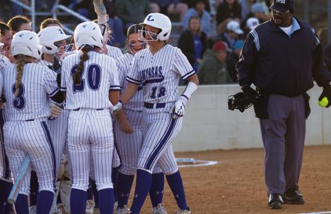 HUNTER KING | DISPATCH RECORD Madison Magilke steps on home plate after her three-run homer against Cedar Park on Monday.