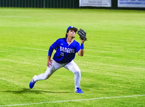 Anthony Dimas looks a pop up into his glove in Tuesday’s contest. HUNTER KING | DISPATCH RECORD