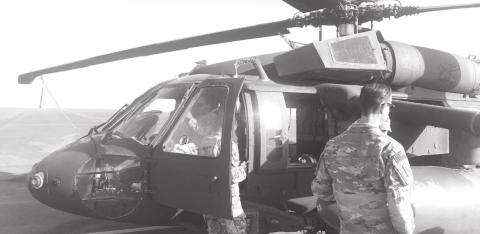 A Blackhawk helicopter is shown here. Flags flown from a military helicopter over Kuwait have been donated to Hanna Springs Elementary School. COURTESY PHOTO