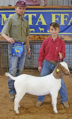 MASON HINES | DISPATCH RECORD Wyatt Tucker took home reserve champion breeding goat honors. He also received the junior showmanship award.