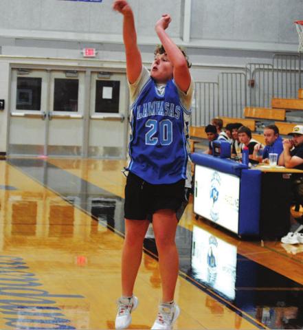 Aidan Nuckles lets a three ball go on his way to 35 points Tuesday. HUNTER KING | DISPATCH RECORD