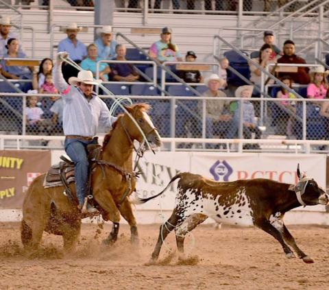 Team ropers set record at Pecos Rodeo