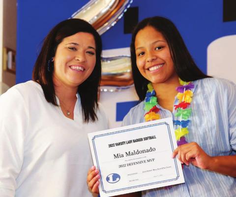 Coach Jessica Harborth, left, poses with Mia Maldonado holding her Defensive MVP award. CHRIS MILES | COURTESY PHOTO