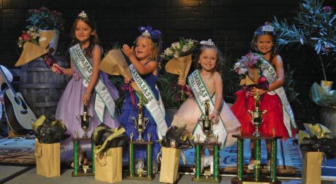 Little Miss Spring Ho court members pose for photos after being crowned during Monday’s festivities. They are, from left to right, third runner-up Kylie Stone, second runner-up Berklee Tucker, first runner-up Berkley Shuffler and Little Miss Spring Ho Lyla Butts. ERICK MITCHELL | DISPATCH RECORD