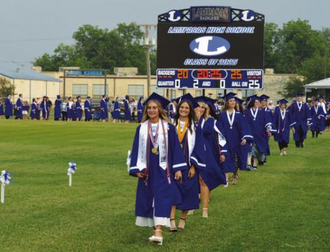 Graduation ceremonies took place Friday at Badger Stadium. Although stormy weather threatened, student presentations proceeded, and commencement took place for the Lampasas High School Class of 2025.. ERICK MITCHELL | DISPATCH RECORD