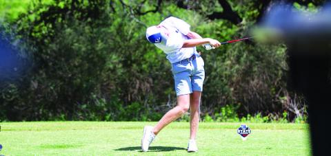 Riley Oestreich swings through a tee shot during the second day of the state golf tournament on Tuesday. HUNTER KING | DISPATCH RECORD