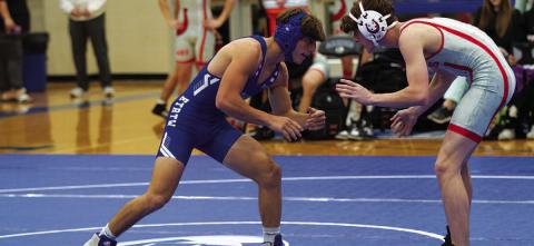 Cole Warren sizes up his opponent during last Wednesday’s wrestling meet. HUNTER KING | DISPATCH RECORD