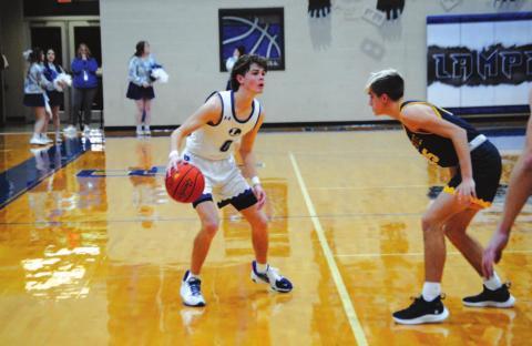 Nate Borchardt sizes up a Stephenville defender during the Badgers’ win at home last week. HUNTER KING | DISPATCH RECORD