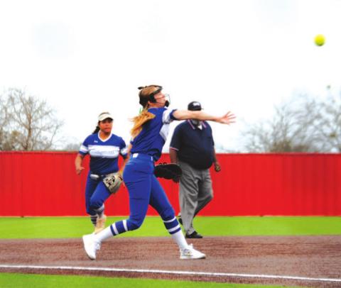 Hadley Oncken makes a throw across from third to first to record an out against the Lady Eagles last Thursday. HUNTER KING | DISPATCH RECORD