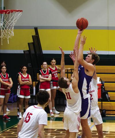 Beau Patterson goes up through contact. He was an all-tournament player last weekend. HUNTER KING | DISPATCH RECORD