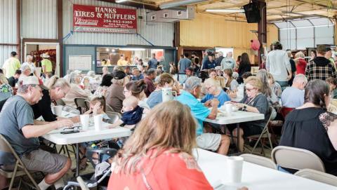 The annual fundraiser event attracts a large crowd of community members with barbecue and unique auction items. The fundraiser accounts for a large part of the department’s revenue each year. File Photo