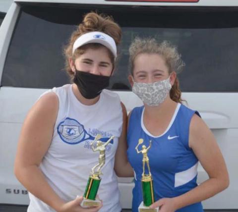 Kailr Clements and Abby Valdez show their third-place doubles trophies from the Cedar Park tournament. KENNETH PEISER | COURTESY PHOTO