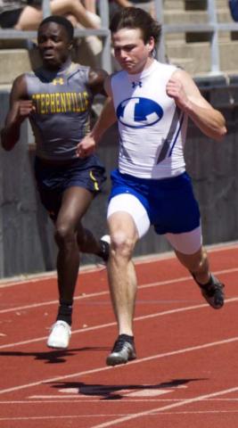 Cade White, right, sprints to first place in the 100-meter dash on Thursday in Brownwood. JEFF LOWE | DISPATCH RECORD