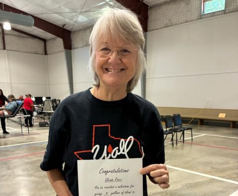 Glenda Rasco participated in the Lampasas community blood drive, held Nov. 11 at First Street Church of Christ’s Family Life Center. She displays the certificate she earned, signifying she has reached the 4-gallon mark for her blood donations. couartesy photo