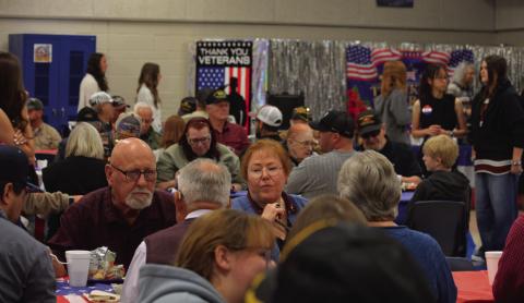 Lampasas Middle School celebrated U.S. Armed Forces veterans with a complimentary breakfast before holding a ceremony in the Bozarth-Fowler Gym on Monday. ERICK MITCHELL | DISPATCH RECORD