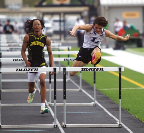Asa White leaps over the final hurdle during the 110-meter race where he placed fourth last week. HUNTER KING | DISPATCH RECORD