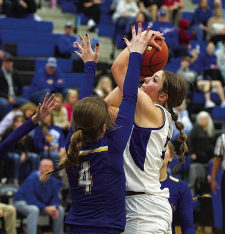 Mia Mulcahy shoots over a Lago Vista defender. The freshman continues to improve this season. HUNTER KING | DISPATCH RECORD