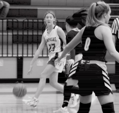 Payton Tatum dribbles the ball while being covered by a Gatesville Hornet. CHRIS YBARRA | DISPATCH RECORD