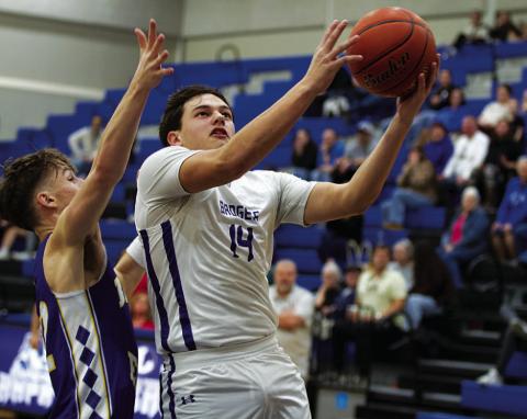 HUNTER KING | DISPATCH RECORD Dylan Polmanteer has been an efficient scorer off the bench for the Badgers.