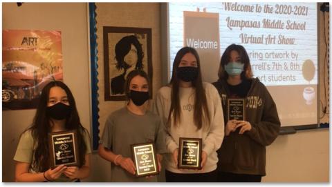 Shown with their plaques are the overall grade-level winners of the Lampasas Middle School Art Show. They are, from left, seventhgraders Sumiko Lemari and Aubrey Stubbs, and eighth-graders Cheyenne Hannibal and Lillie Jones. COURTESY PHOTO