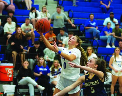 Addison Borchardt goes to the basket against Stephenville. The senior finished with 16 points in the home opener. HUNTER KING | DISPATCH RECORD