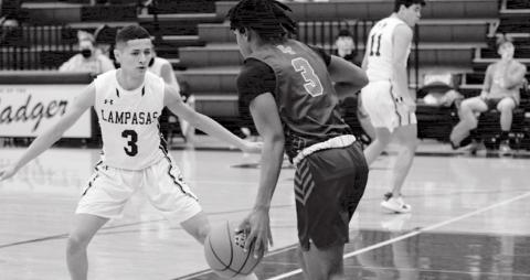 Jacob Hogeda, left, defends against Georgetown East View in the Badgers’ last home game before Thanksgiving. Thursday after press time, the Badgers were scheduled to play at Thorndale.