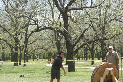 Luke Coonrod, 16, from Troop 200 in Lampasas, throws a tomahawk during the San Saba Mountain Man Campout. | Photo by Sherryl-Lynn Gooch