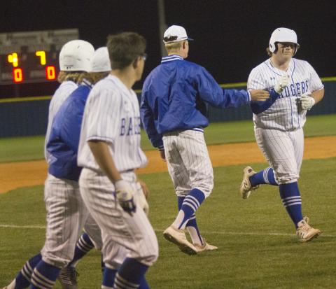 Teammates congratulate Hayden Waldrip, (far right) on a three-run home run in the bottom of the seventh against Gatesville on Thursday. 