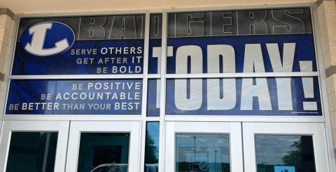 Doors at the entrance of Lampasas High School feature a new design to encourage positive character qualities
