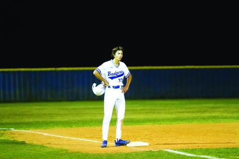 Jackson Wright catches his breath on base in a game earlier this season. HUNTER KING | DISPATCH RECORD