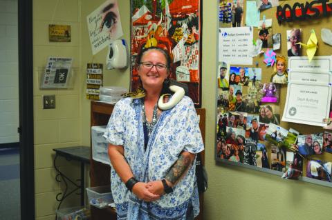Lampasas High School science teacher Dejah Bushong and her ball python each shed a smile for the camera. Bushong was named Lampasas ISD’s secondary teacher of the year. ERICK MITCHELL | DISPATCH RECORD