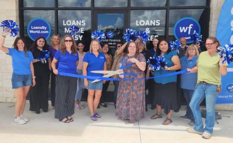 World Finance recently held a ribbon-cutting event at its new location at 1010 E. Fourth St. in Lampasas. Holding the ceremonial scissors is Branch Manager Michelle Blankenship. She is joined by World Finance employees and management, as well as Chamber of Commerce staff and board members
