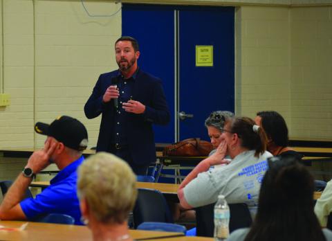 Justin Bell, of WRA Architects, presents costs of potential bond projects to committee members. ERICK MITCHELL | DISPATCH RECORD