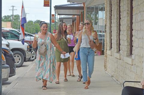 Quaint shops, a variety of beverage options and a leisurely walk with friends are all part of the second annual Spring Ho Sip ‘N’ Shop, scheduled for July 7. ERICK MITCHELL | DISPATCH RECORD