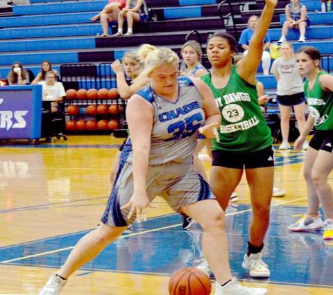 Kyliegh Ball (35) dribbles around a Burnet defender on Monday. JEFF LOWE | DISPATCH RECORD