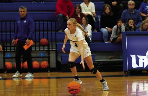 Adalya White dribbles up top during the Lady Badgers’ win on Tuesday. HUNTER KING | DISPATCH RECORD