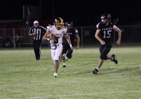 Senior Alonso Caso runs with the ball during Lometa’s 64-18 mercy-rule win over Ranger last Friday. JESSICA MALDONADO | DISPATCH RECORD