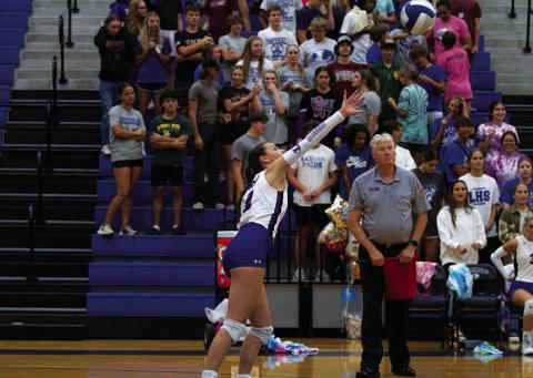 HUNTER KING | DISPATCH RECORD Landry White sends a serve over the net during the match against Gateway.