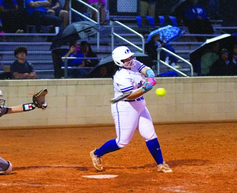 HUNTER KING | DISPATCH RECORD Amari Munoz hits a line drive to right center field late in Thursday’s contest.